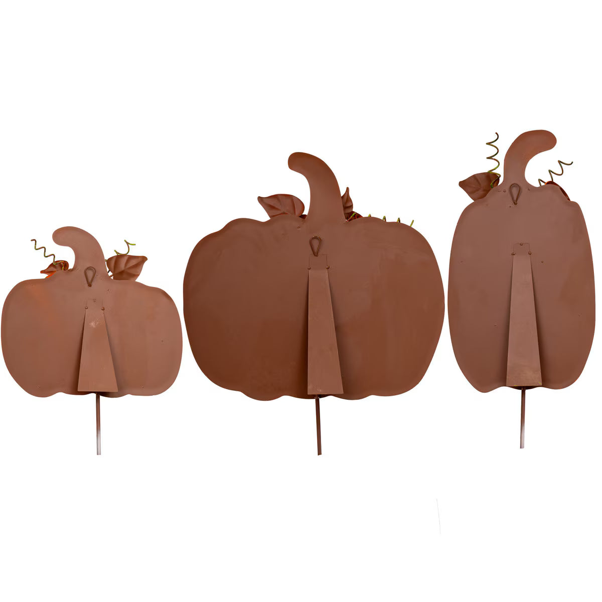 Back view of three orange metal ribbon pumpkins with attached stakes, easel stands, and hanging loops.