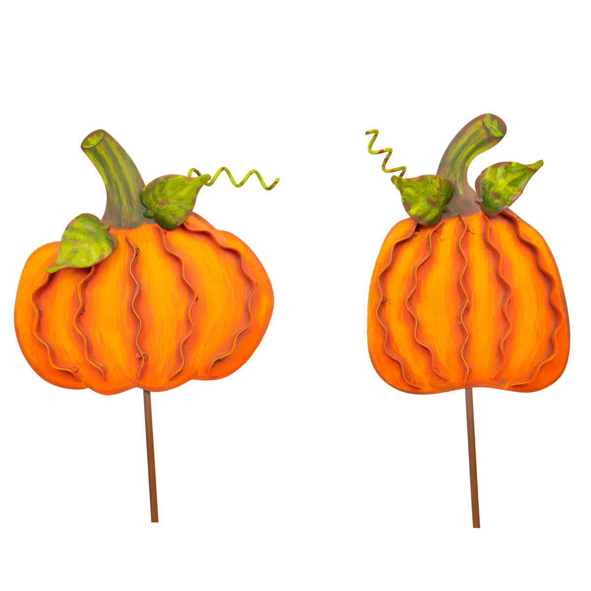 Set of two orange metal pumpkins with ribbon detailing, green leaves, and stems, designed for tabletop or garden display.