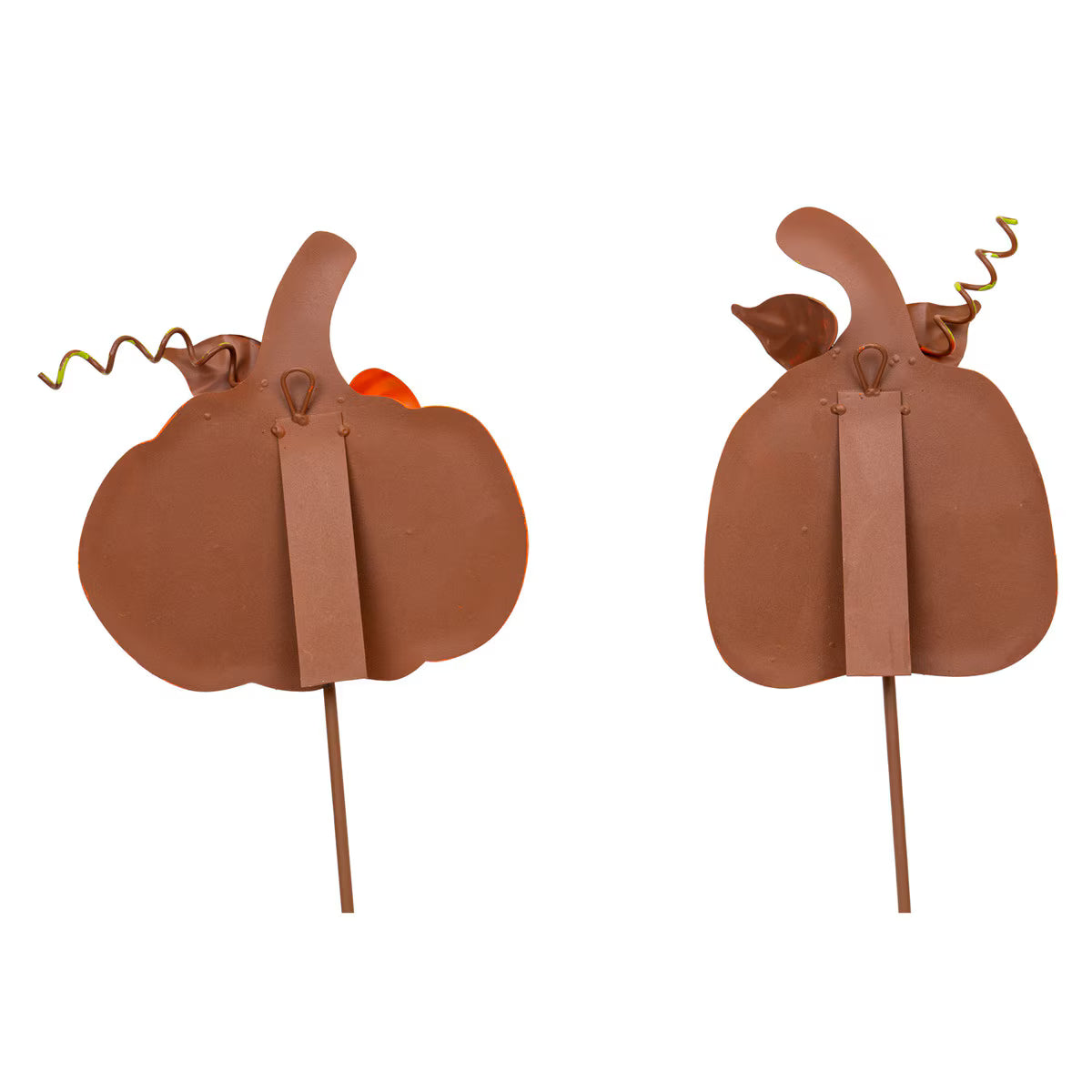 Back view of two orange metal ribbon pumpkins with attached stakes and hanging loops for fall decor.