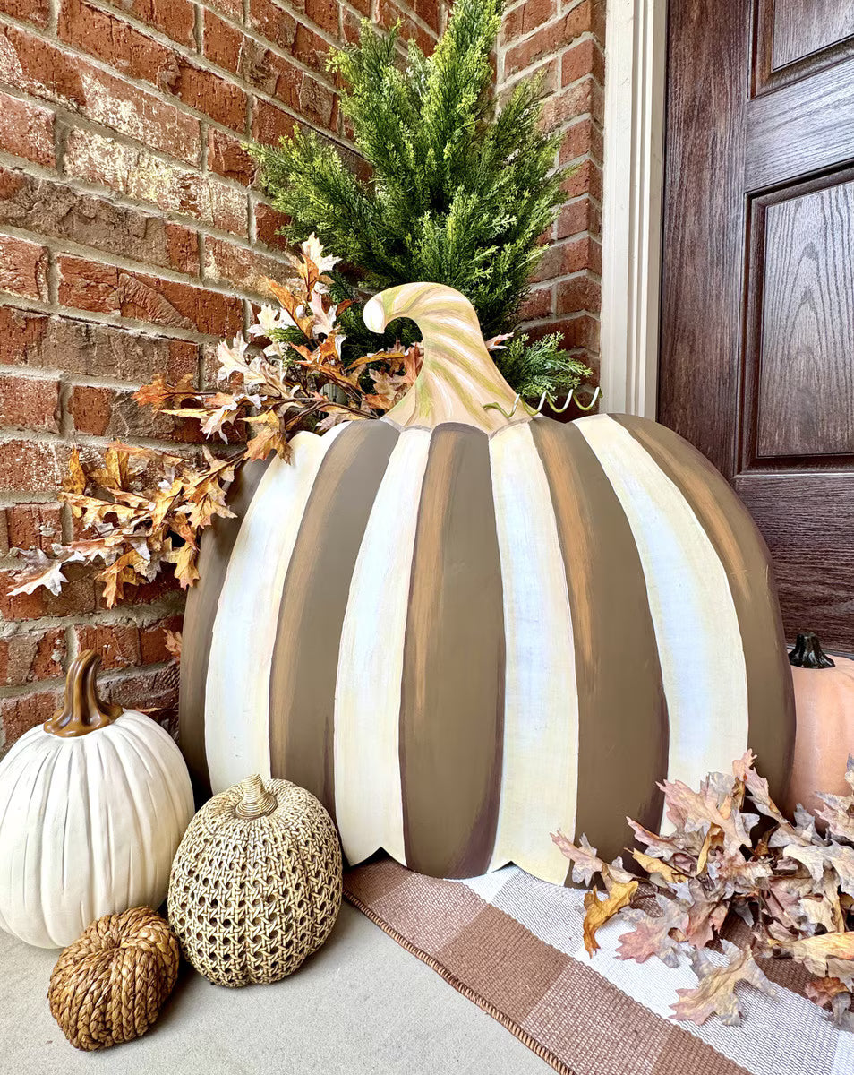 Large chocolate and cream striped decorative pumpkin for fall porch decor, measuring 27.5 inches tall.