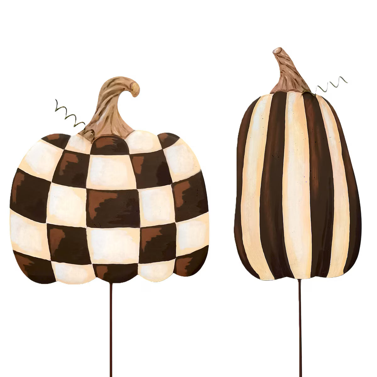 Two decorative pumpkins with brown and cream checkered and striped patterns on metal stakes for fall garden decor.