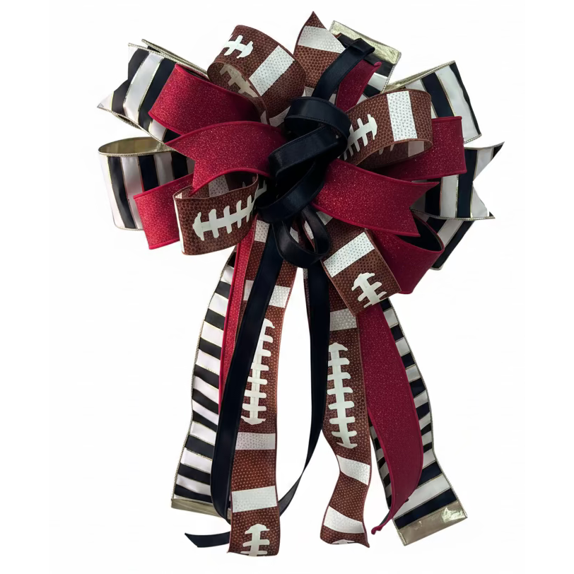 Large red and black football-themed bow with glitter accents, striped ribbon, and long tails for sports decor.