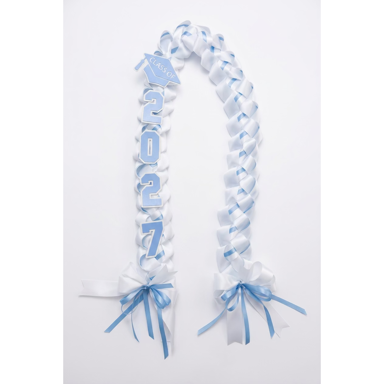 White and light blue sparkly graduation lei with CLASS OF cap charm