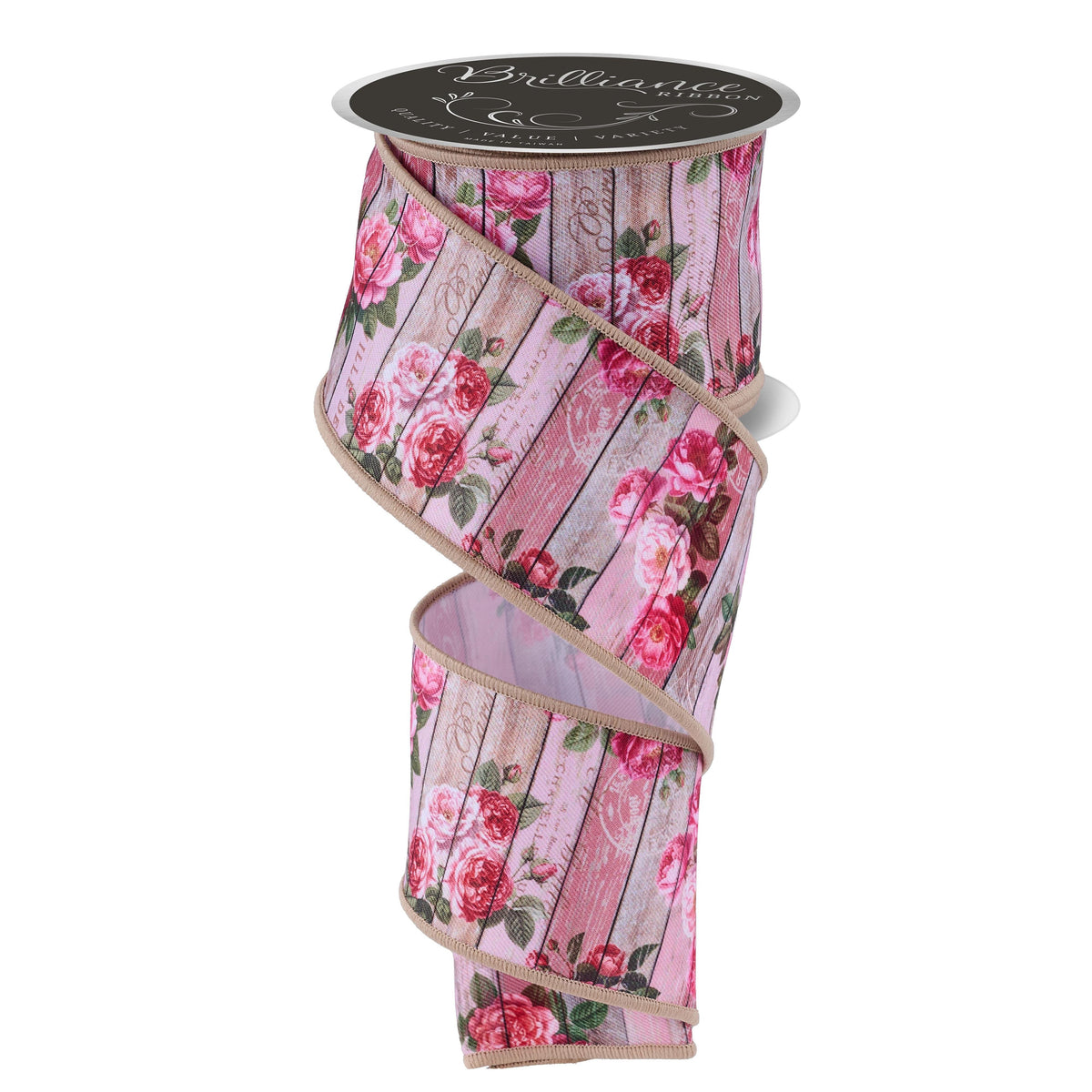 Wired edge ribbon spool featuring pink roses on distressed wood