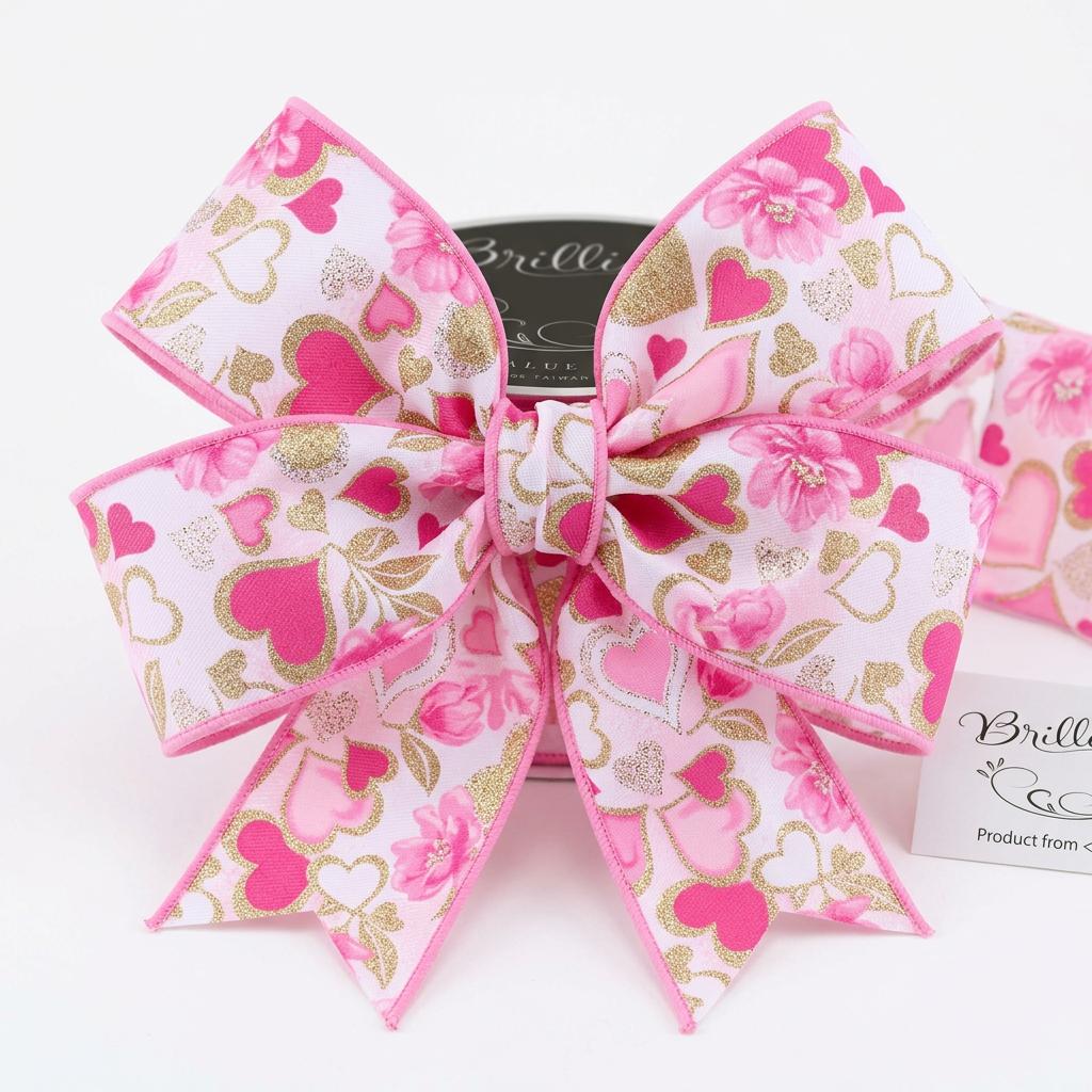 Close-up of pink floral and glitter heart pattern on wired edge ribbon