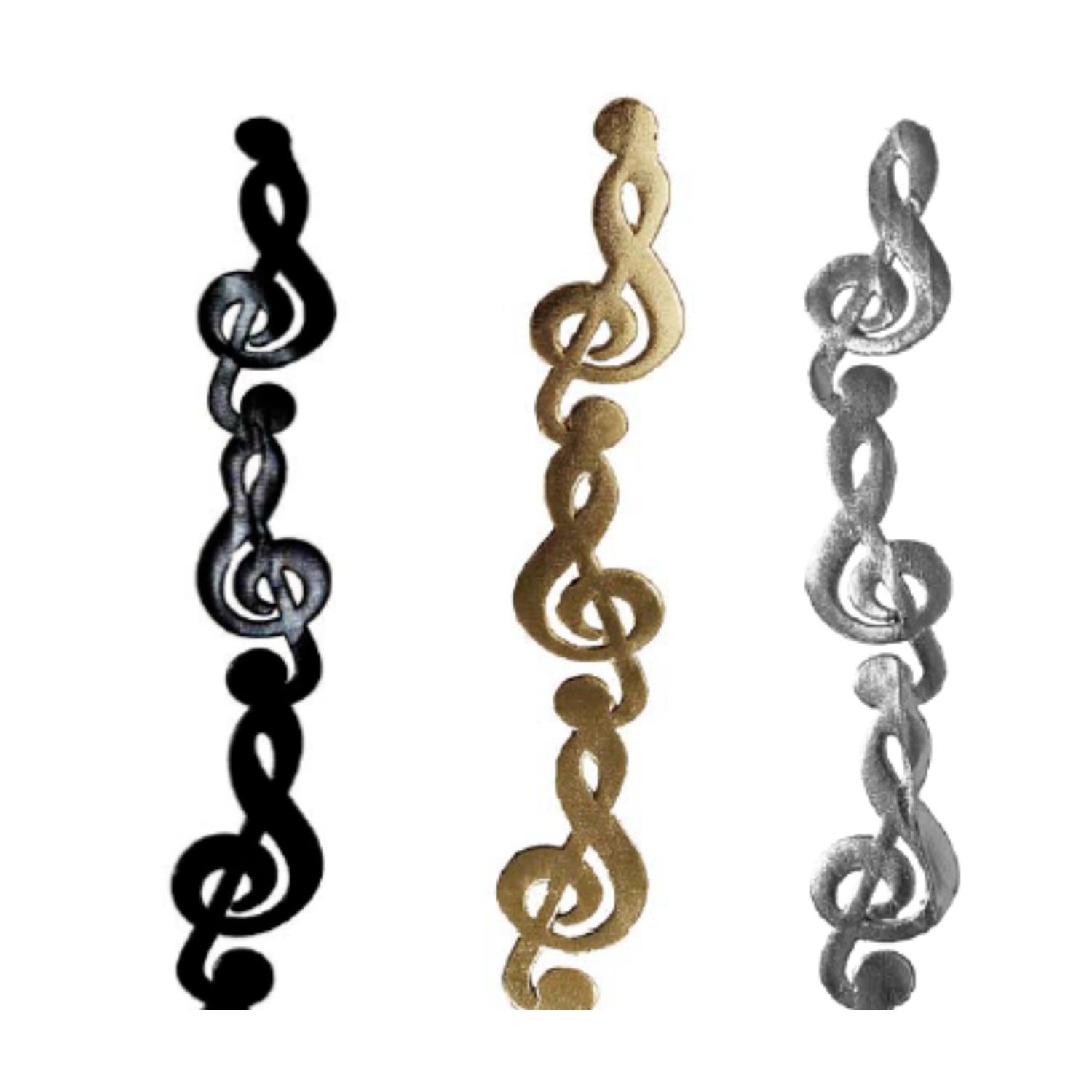 Set of metallic vinyl music note garlands in black, gold, and silver