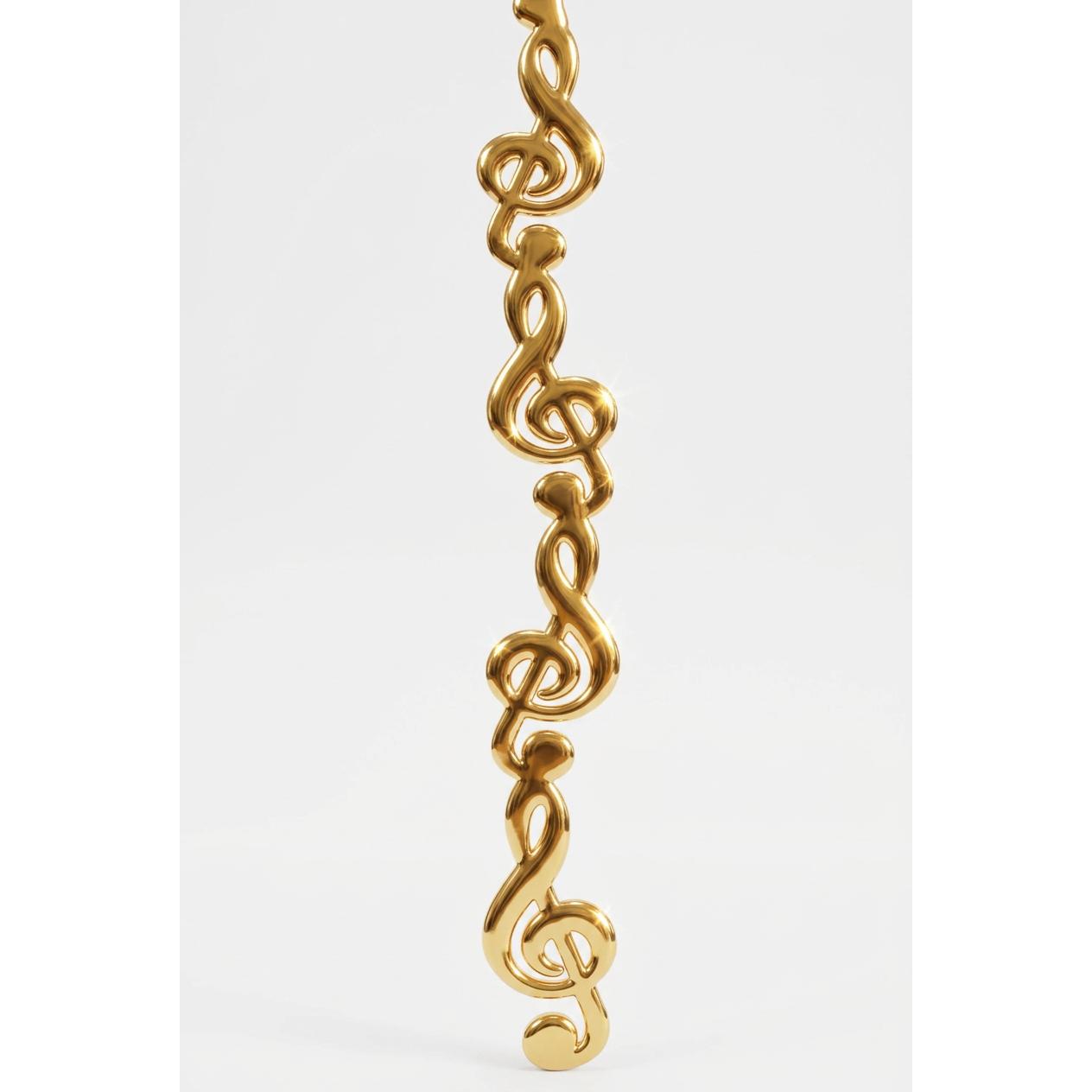 Metallic gold vinyl music note garland for homecoming mums