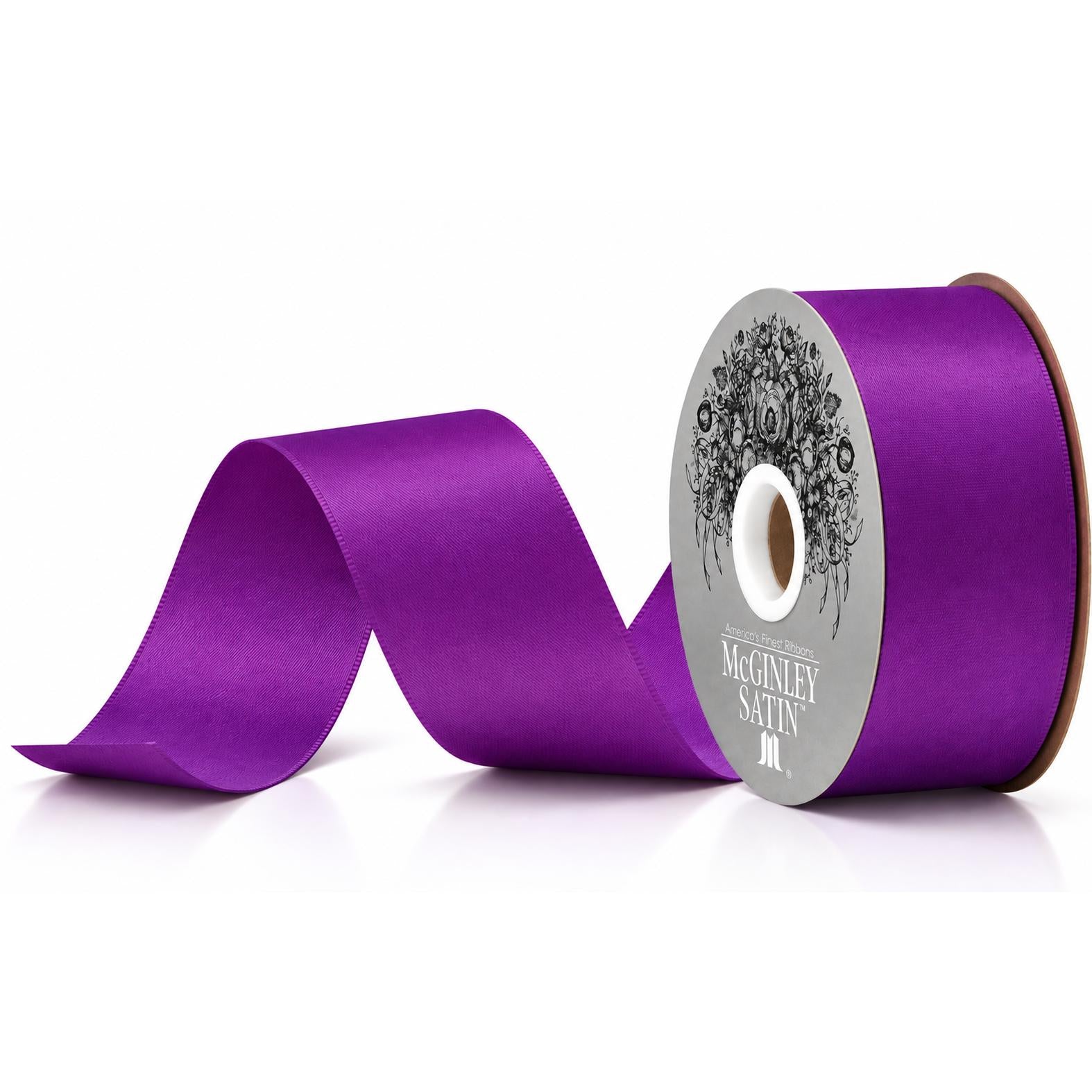 Purple satin acetate ribbon roll with silver McGINLEY label