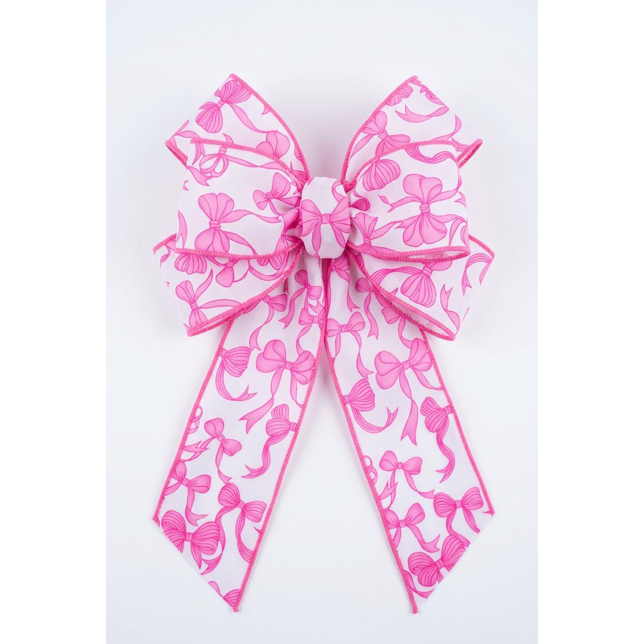 Dimensional hot pink bow on white wired ribbon for gift wrapping