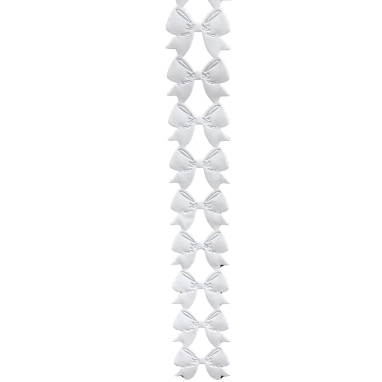 White metallic vinyl puffy bow garland with glossy texture