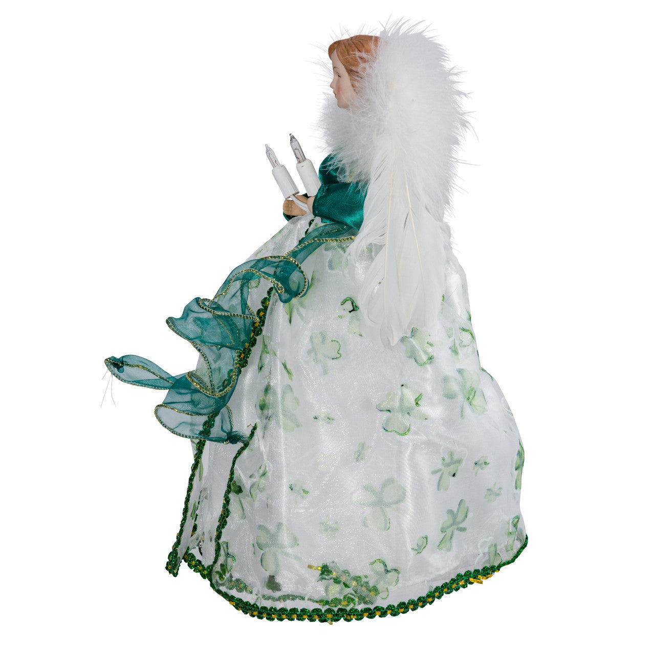 Side profile of angel tree topper holding unlit candle sockets
