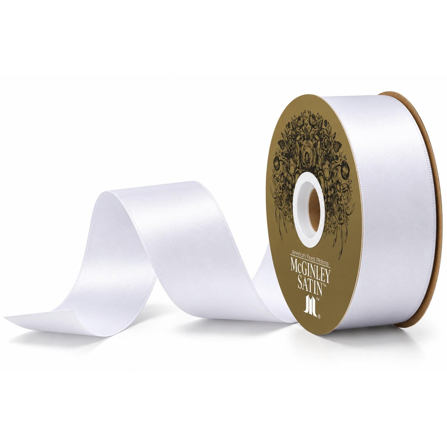 White satin ribbon roll with curled end and branded gold label