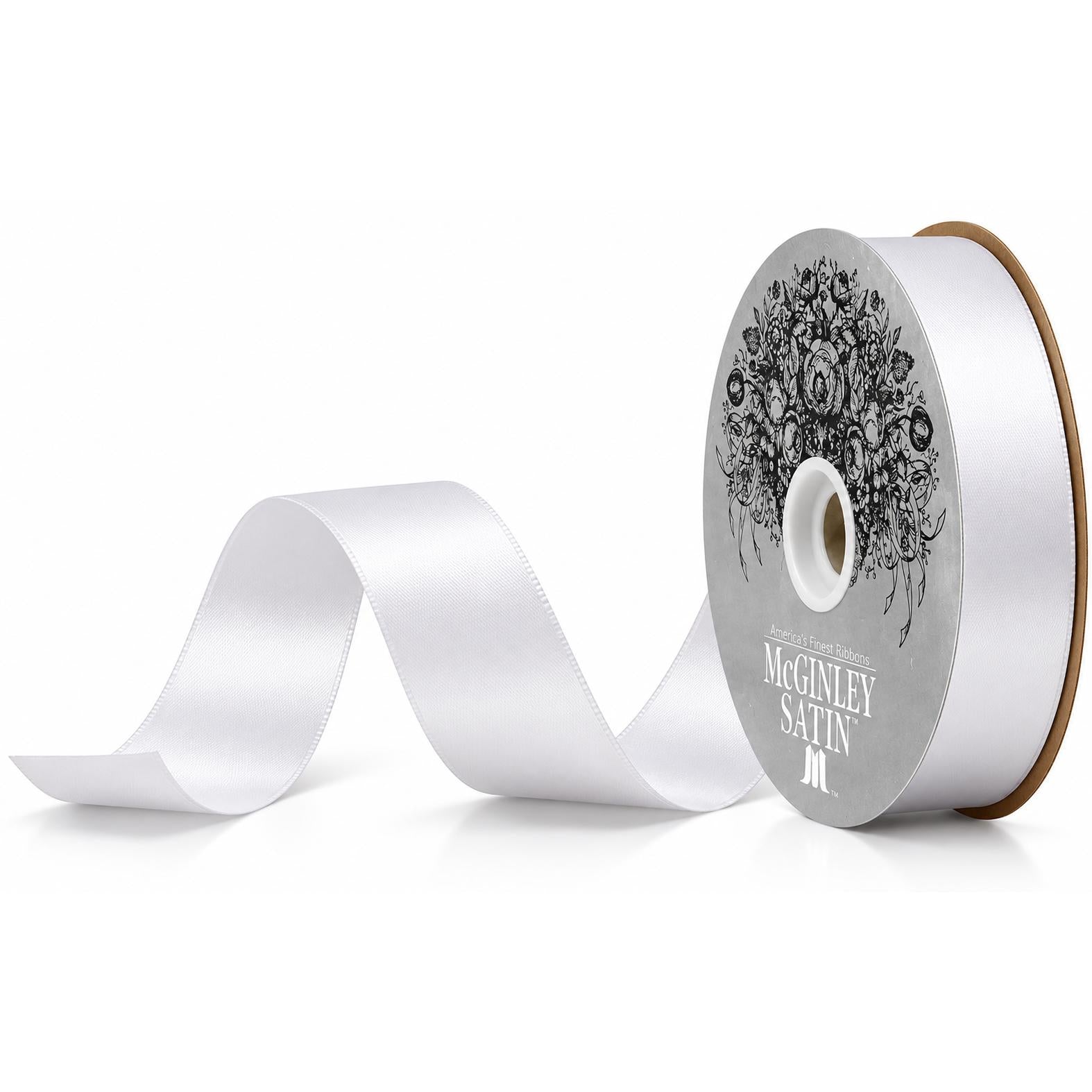 White satin acetate ribbon spool with smooth lustrous finish and stitched edges