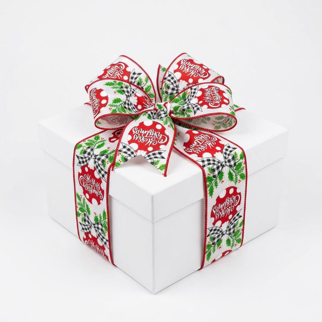 Gift box wrapped in white satin ribbon featuring red ornament and Merry Christmas print