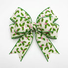 Close-up of red and green holly patterned wired edge ribbon