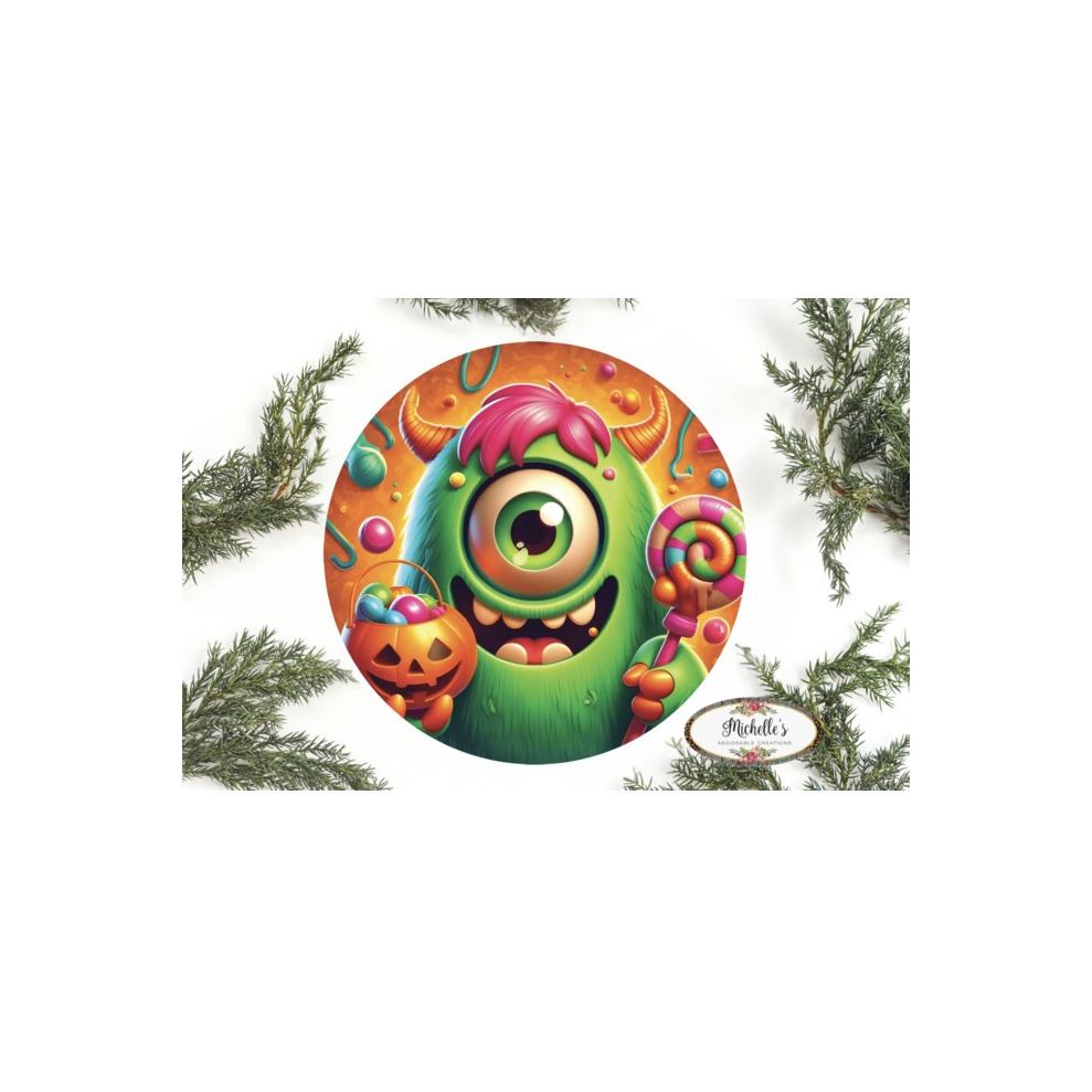 Shop For One Eyed Green Candy Halloween Monster Round Sign at Michelle's aDOORable Creations