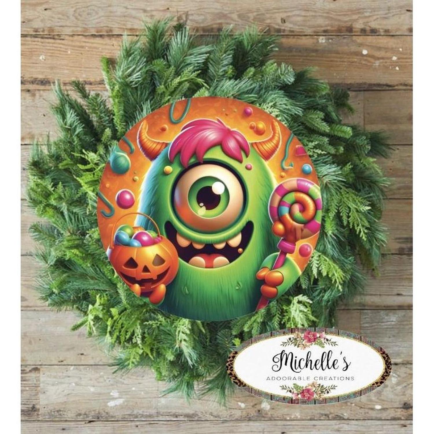 One Eyed Green Candy Halloween Monster Round Sign