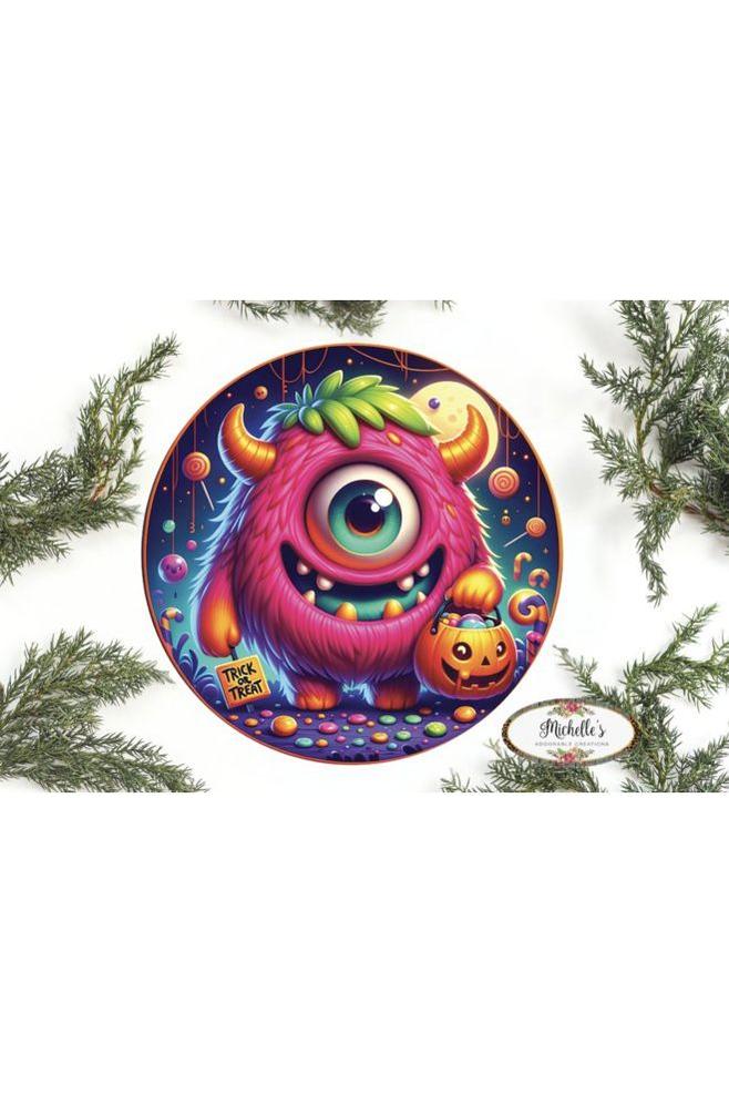 Shop For Pink One Eyed Trick or Treat Monster Round Sign at Michelle's aDOORable Creations