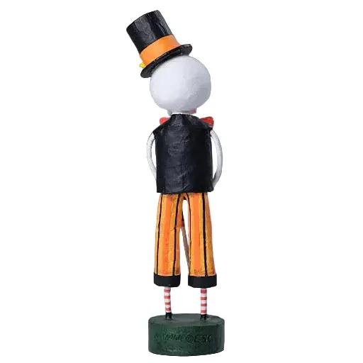 Lori Mitchell 8-inch skeleton figurine wearing a top hat, bow tie, and orange striped pants for Day of the Dead.