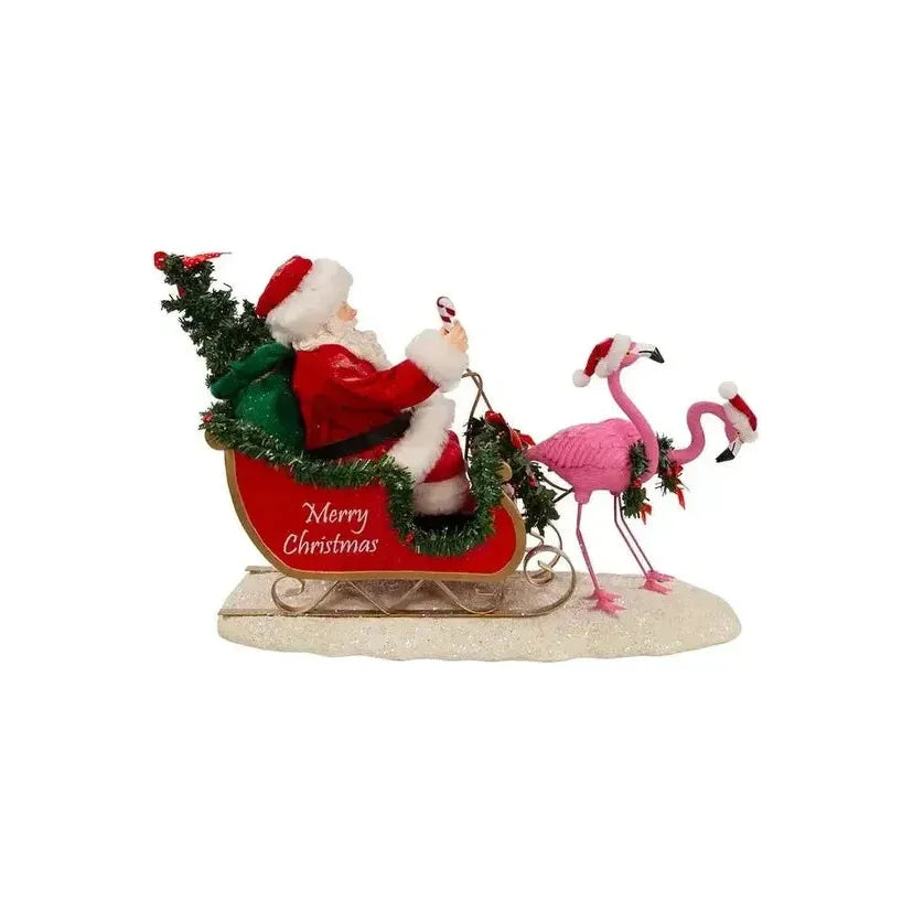 Shop For Kurt Adler 10" Fabriché™ Santa In Sleigh With Flamingos at Michelle's aDOORable Creations