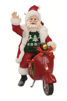 Shop For Kurt Adler 10" Fabriché™ Santa On Scooter at Michelle's aDOORable Creations