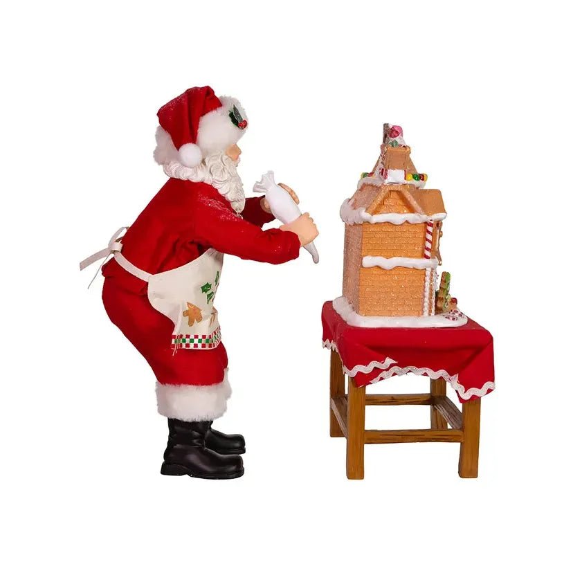Shop For Kurt Adler 10.5" Fabriche Santa Decorating LED Gingerbread House Table Piece at Michelle's aDOORable Creations